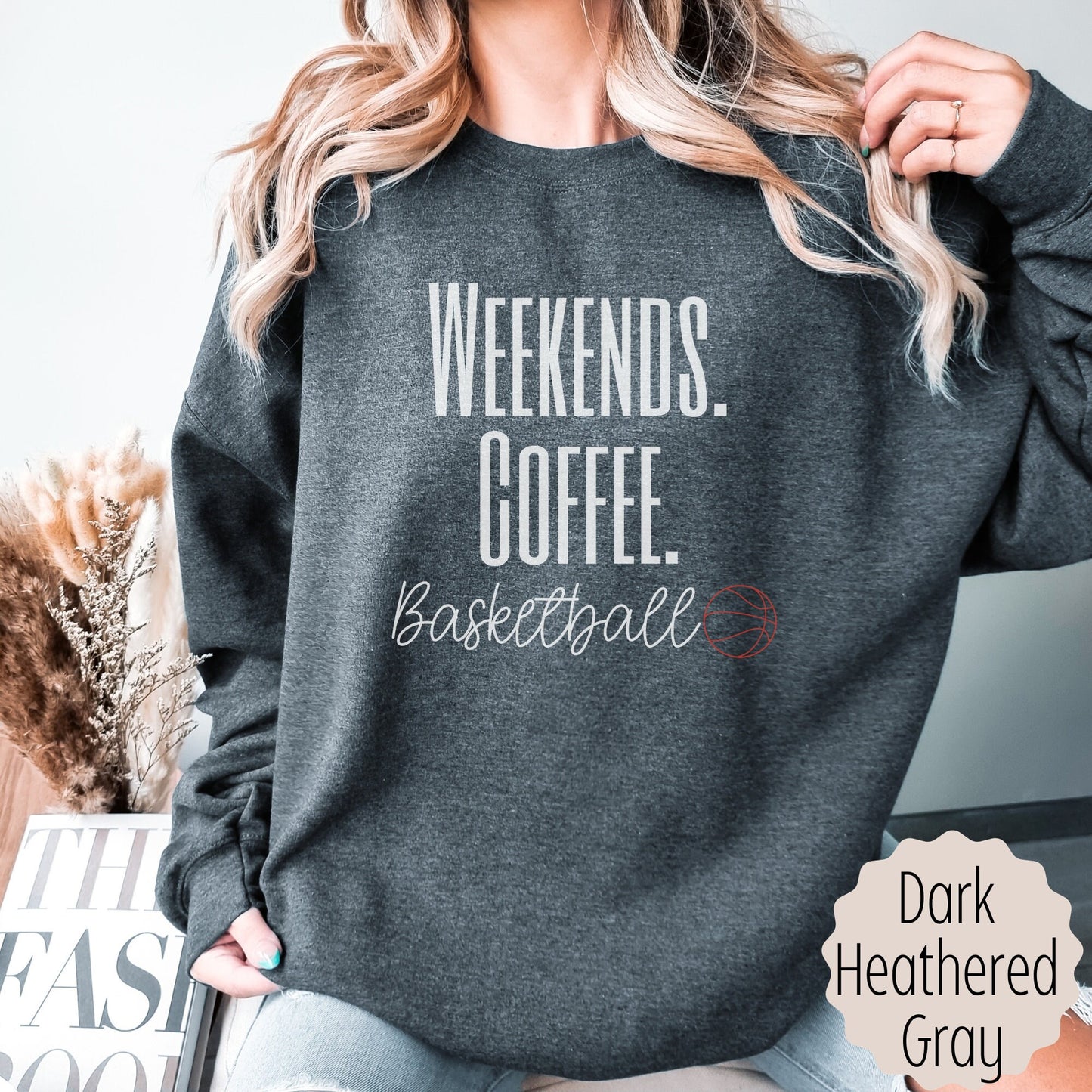 Basketball mama gift for sports lover that says weekends coffee basketball with a black outlined basketball. This comes in ash gray, sand, black, white, or heathered dark gray.