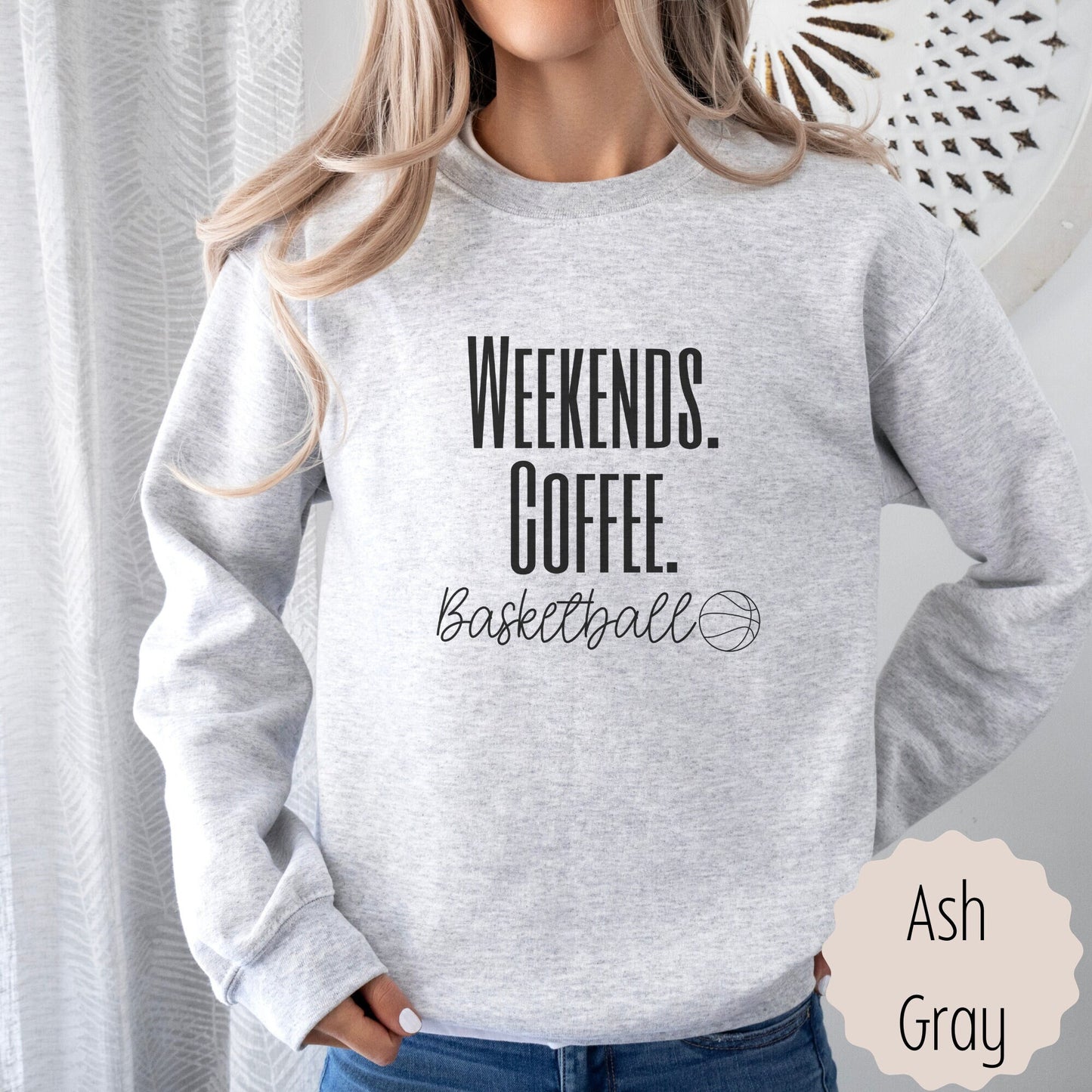 Basketball mom sweatshirt that says weekends coffee basketball with a black outlined basketball. This comes in ash gray, sand, black, white, or heathered dark gray.