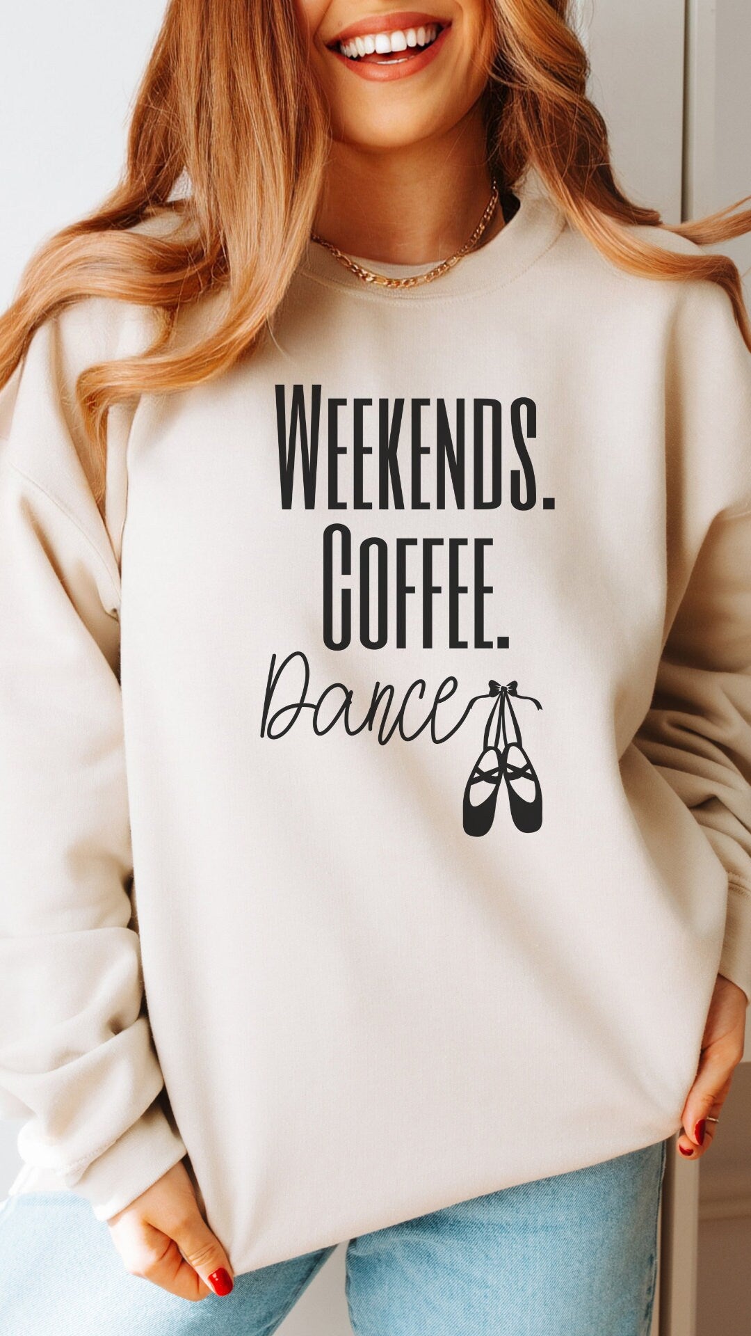 ballet mom sweatshirt that says weekends coffee dance with ballet slippers after the word dance. This sweatshirt comes in sand, black, white, dark heathered gray, and ash gray.