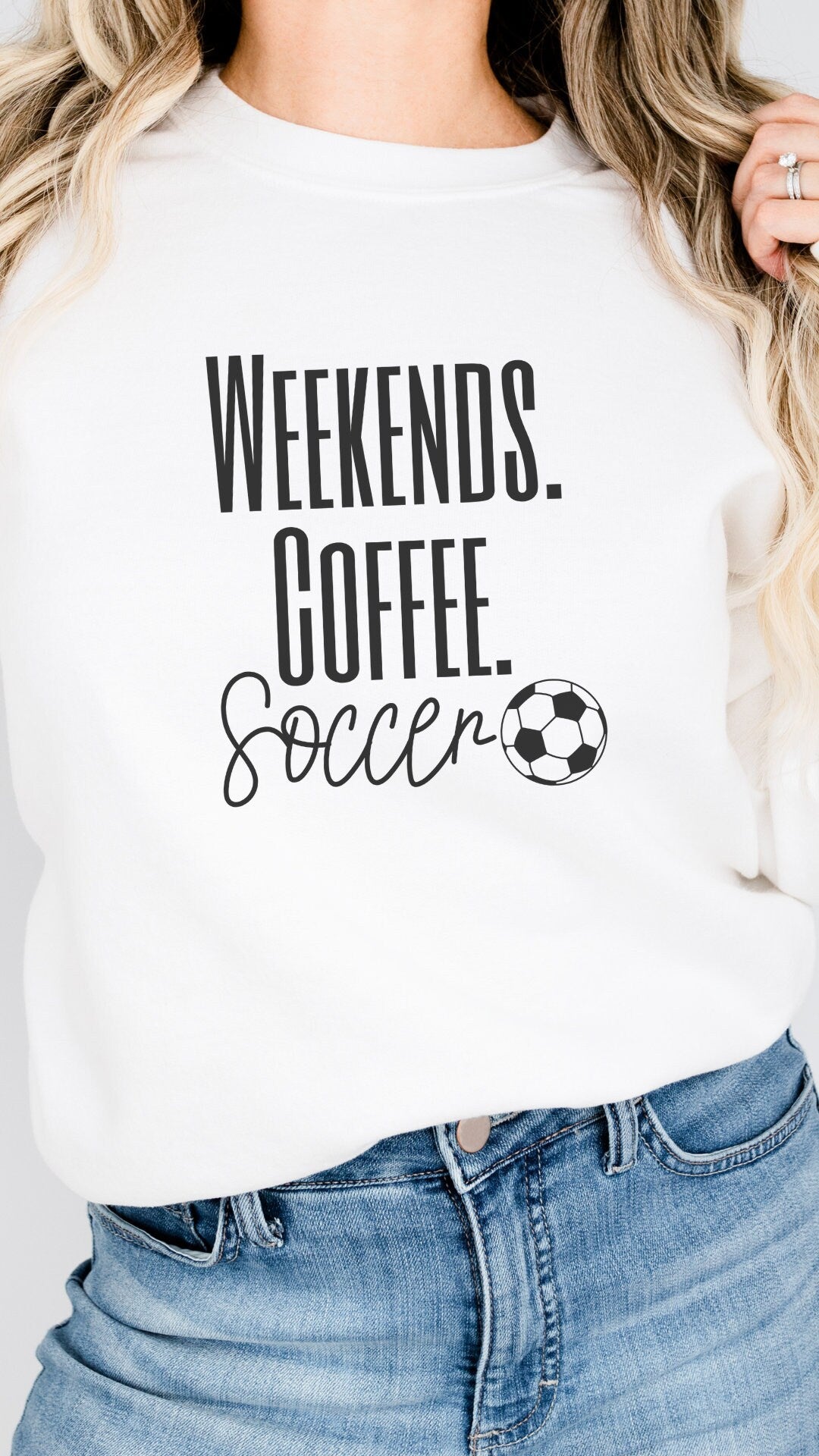 coffee and soccer lover shirt for Moms that says weekends coffee soccer with a black outlined soccer ball on the bottom. This sweatshirt comes in sand, white, black, gray, and heareth dark gray.