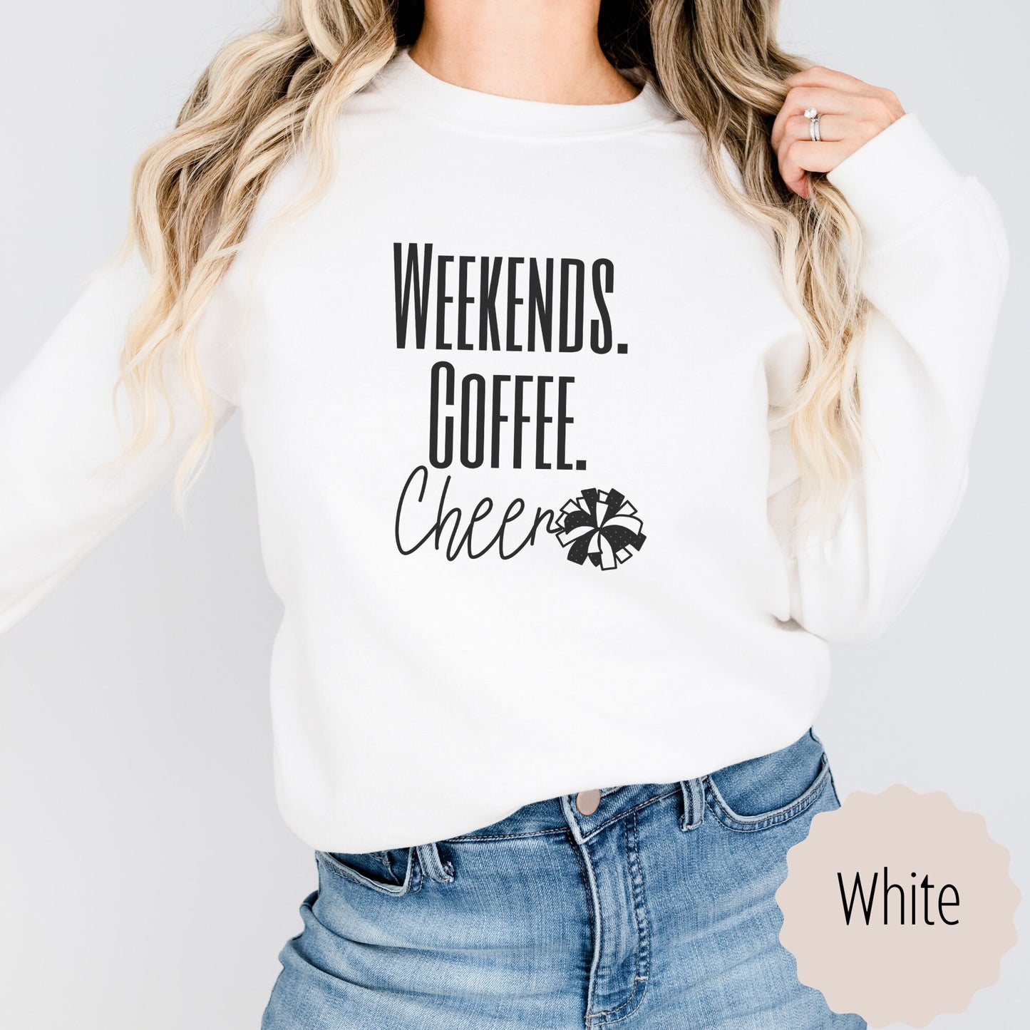 cheer mama sweatshirt for sports lover that says weekends coffee cheer with a pom pom. This is plain text lettering and the sweatshirt comes in the colors ash grey, black, sand, white, and dark heathered grey.